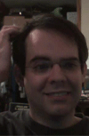 Brained... loveable nerd with an amazingly sharp brain... considering how frequently he bumps his head